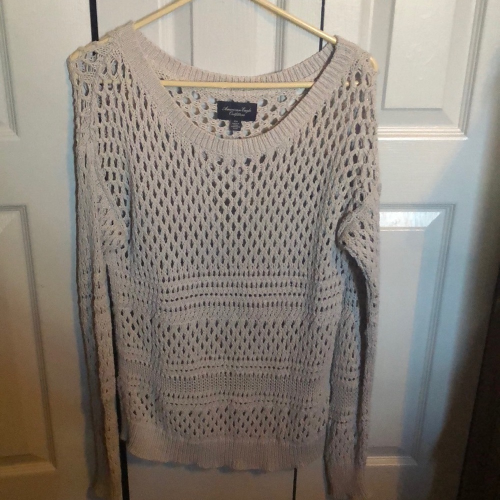 Sweater with holes